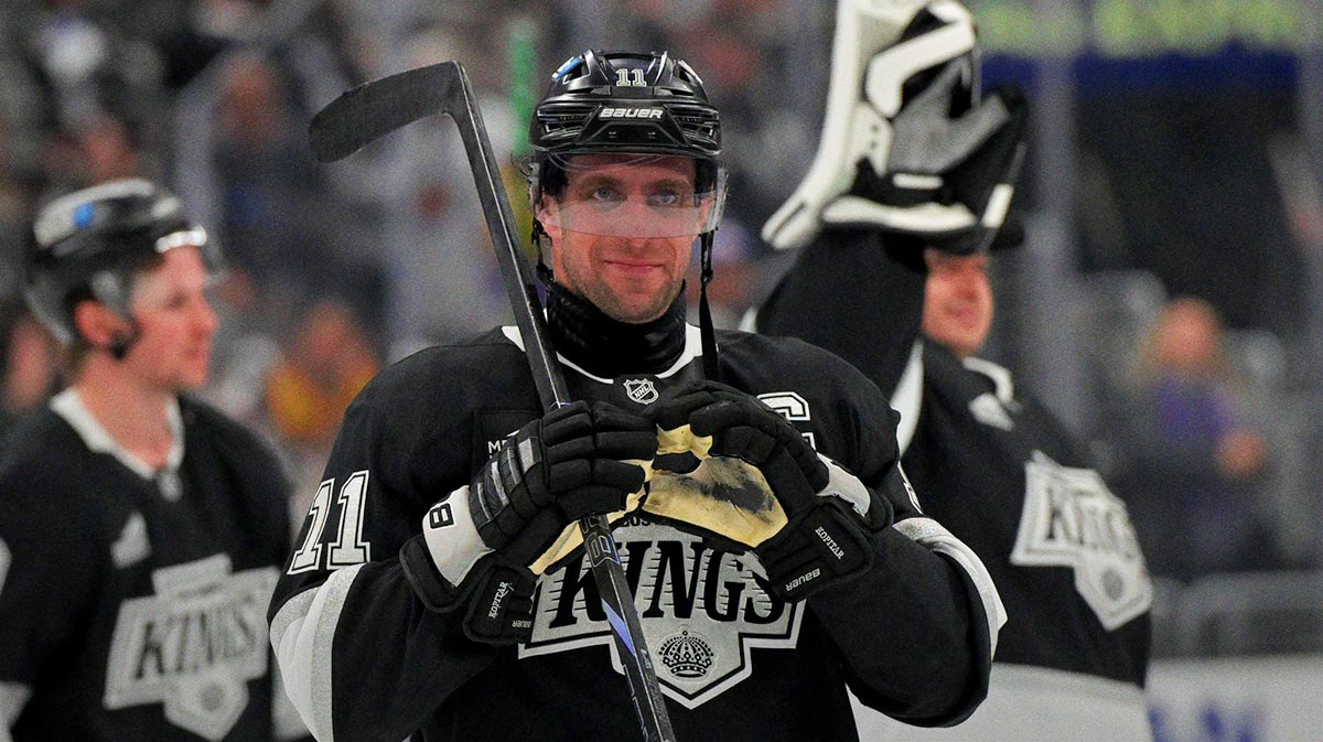 Los Angeles Kings center Anze Kopitar (11) makes a heart with his gloves for he daughter after defeating the Edmonton Oilers in game 2 of the 2025 Stanley Cup Playoffs at Crypto.com Arena.