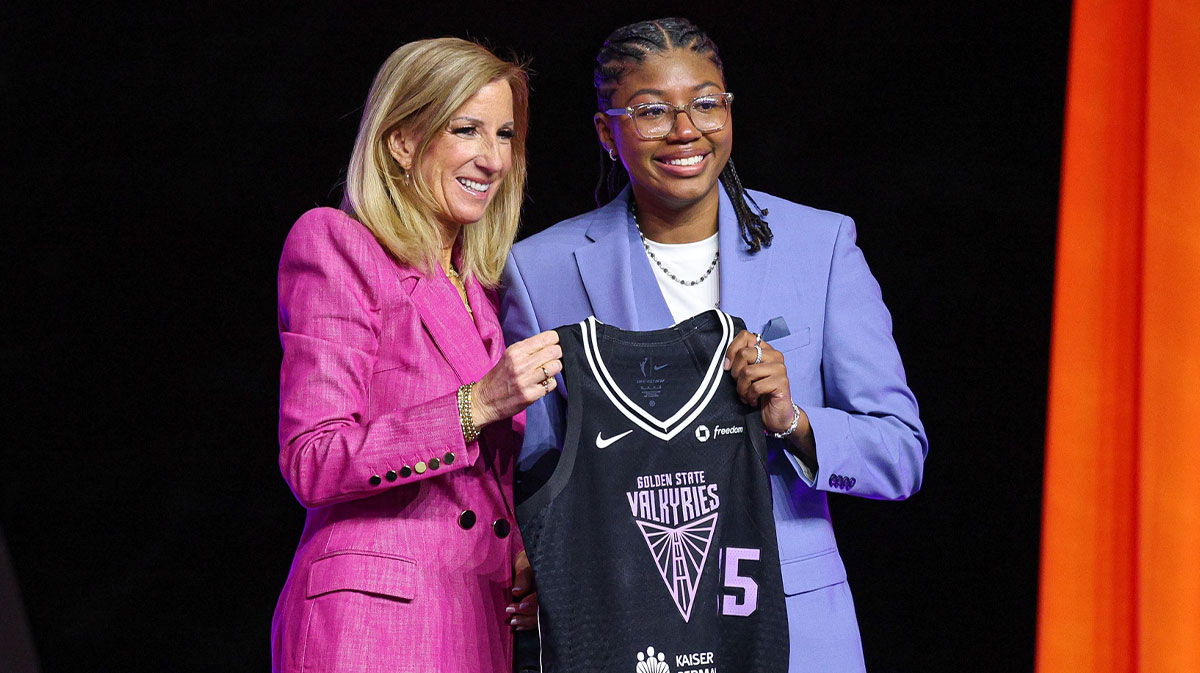 Shyanne Sellers poses with WNBA commissioner Cathy Engelbert after being selected with the number seventeen overall pick to the Golden State Valkyries in the 2025 WNBA Draft at The Shed at Hudson Yards.