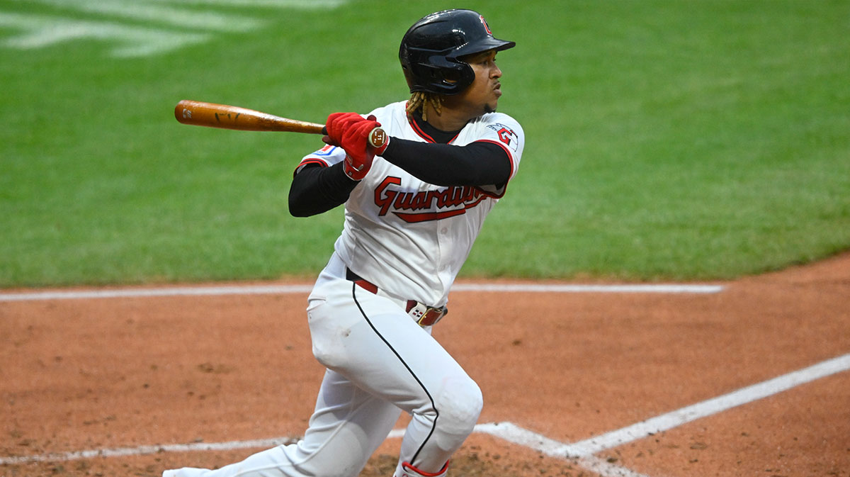 Apr 30, 2025; Cleveland, Ohio, USA; Cleveland Guardians third baseman Jose Ramirez (11) singles in the seventh inning against the Minnesota Twins at Progressive Field. Mandatory Credit: David Richard-Imagn Images