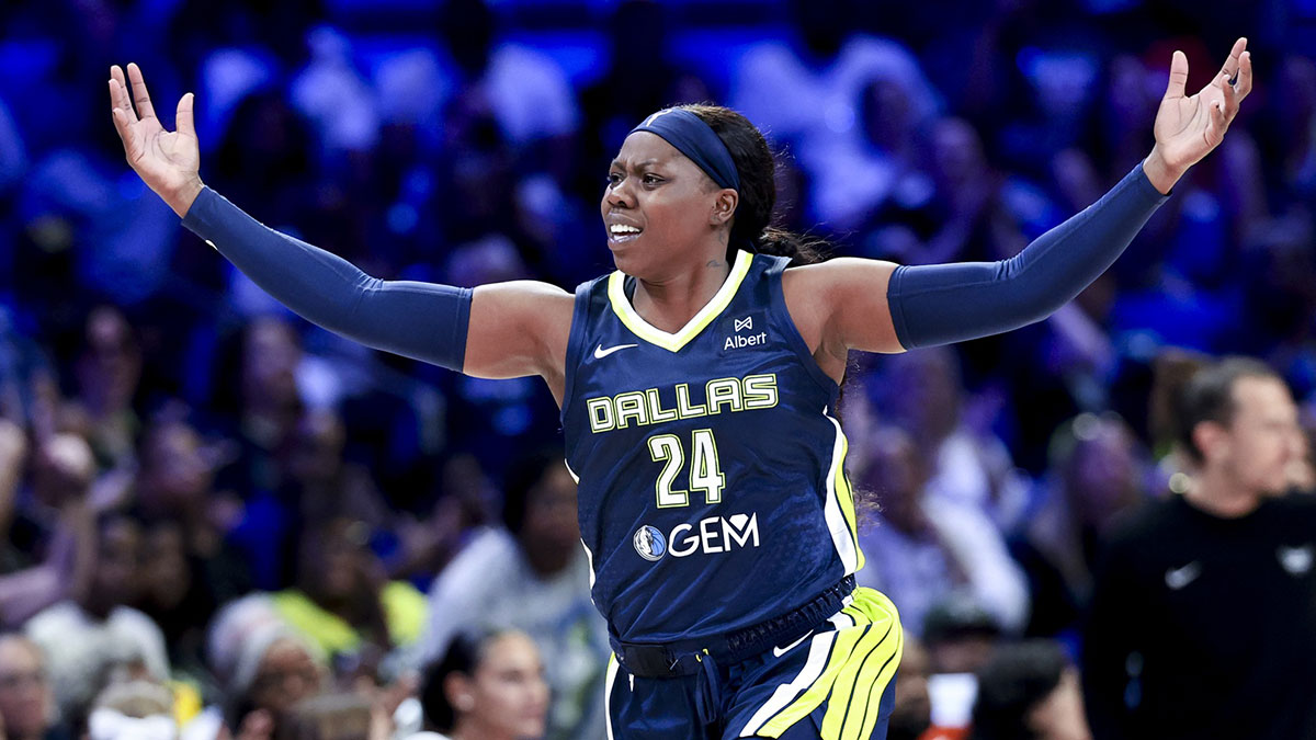 Dallas Wings guard Arike Ogunbowale (24) reacts after scoring against the Minnesota Lynx during the first half at College Park Center.