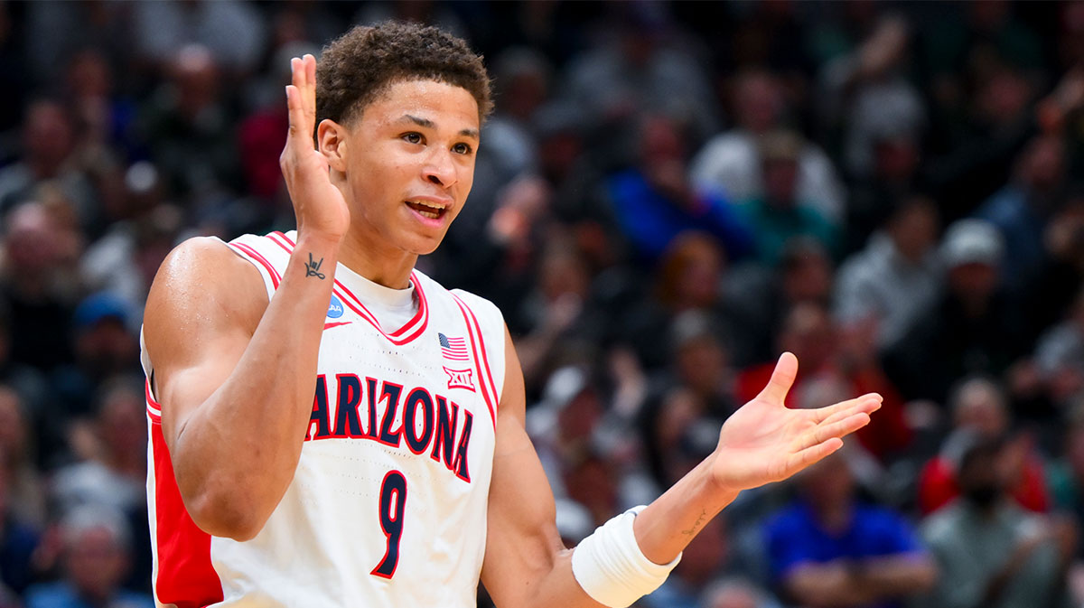 Arizona Wildcats forward Carter Bryant (9) reacts against the Oregon Ducks in the first half at Climate Pledge Arena.