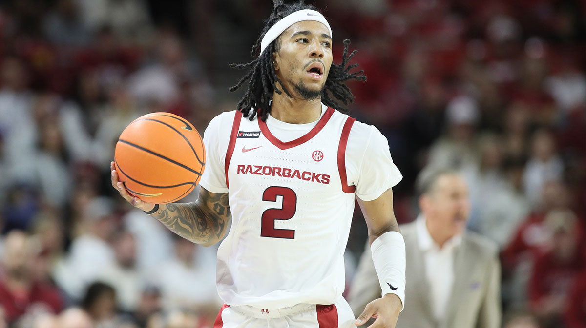 Arkansas Razorbacks guard Boogie Fland (2) dribbles during the first half against the Florida Gators at Bud Walton Arena.