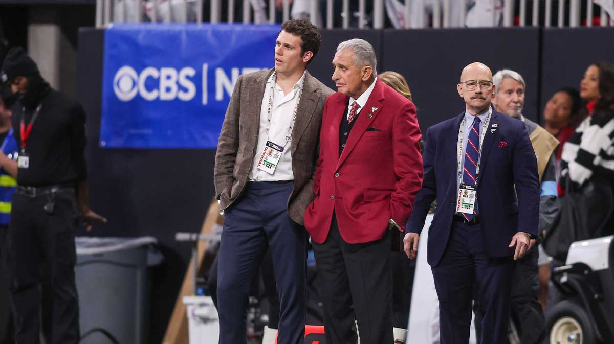 Atlanta Falcons owner Arthur Blank and son Josh Blank on the sideline against the Carolina Panthers in the fourth quarter at Mercedes-Benz Stadium.