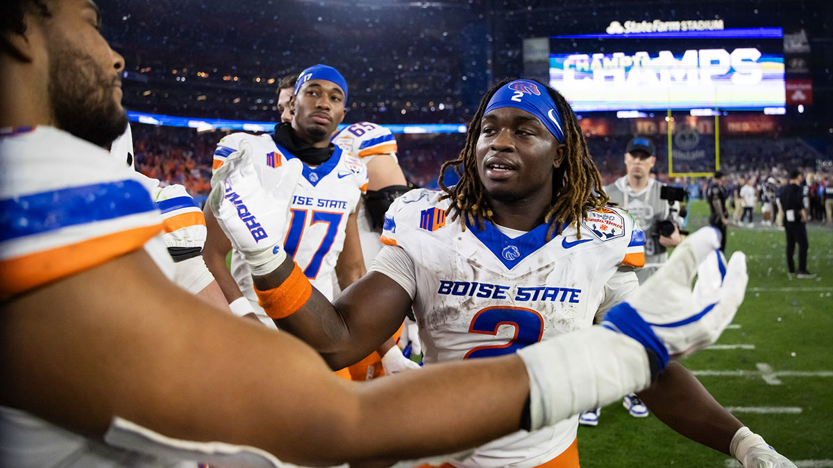 Boise State Broncos running back Ashton Jeanty (2) greets teammates following the game against the Penn State Nittany Lions during the Fiesta Bowl at State Farm Stadium.