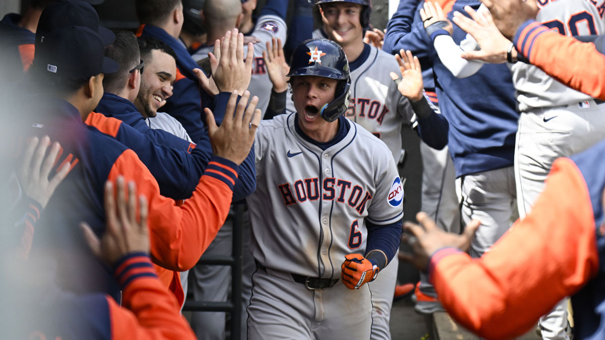 Houston Astros outfielder Jake Meyers (6) celebrates in the dugout after he hits a three run home run against the Chicago White Sox during the sixth inning at Rate Field.