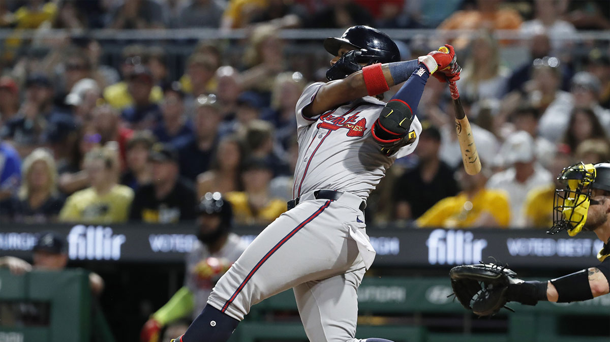 Atlanta Braves right fielder Ronald Acuna Jr. (13) hits a three-run home run against the Pittsburgh Pirates during the eighth inning at PNC Park.