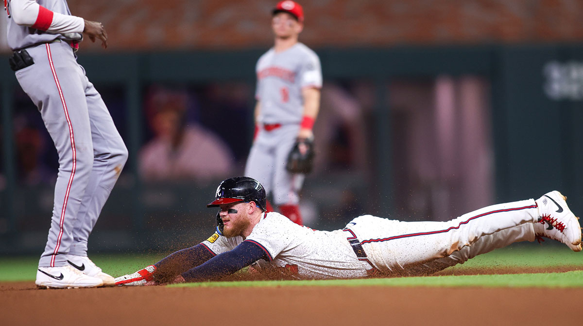 Atlanta Braves left fielder Alex Verdugo (8) steals second base against the Cincinnati Reds in the seventh inning at Truist Park.