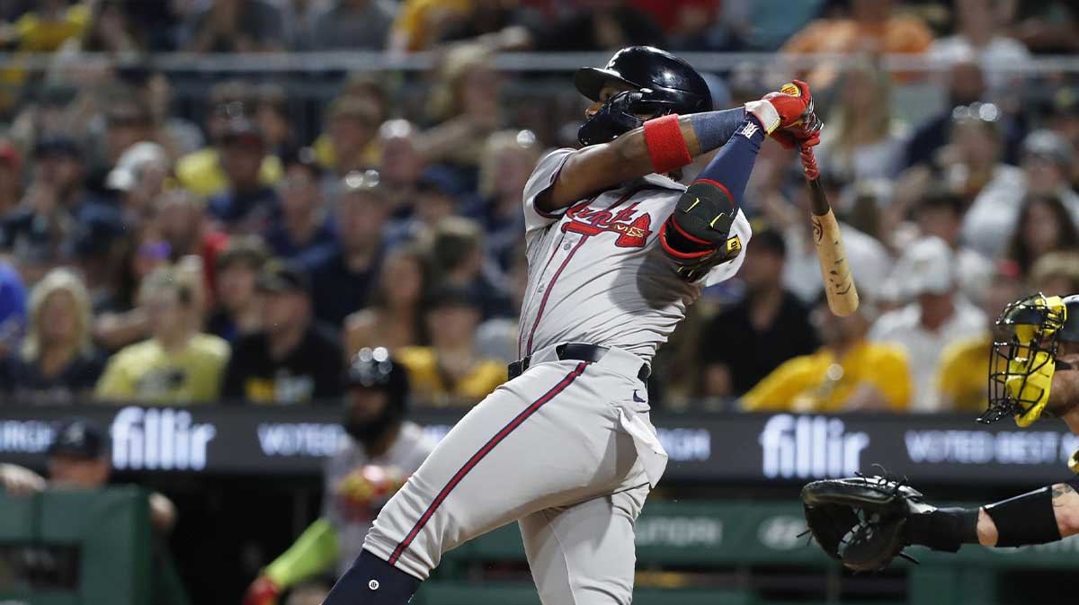 Atlanta Braves right fielder Ronald Acuna Jr. (13) hits a three-run home run against the Pittsburgh Pirates during the eighth inning at PNC Park.