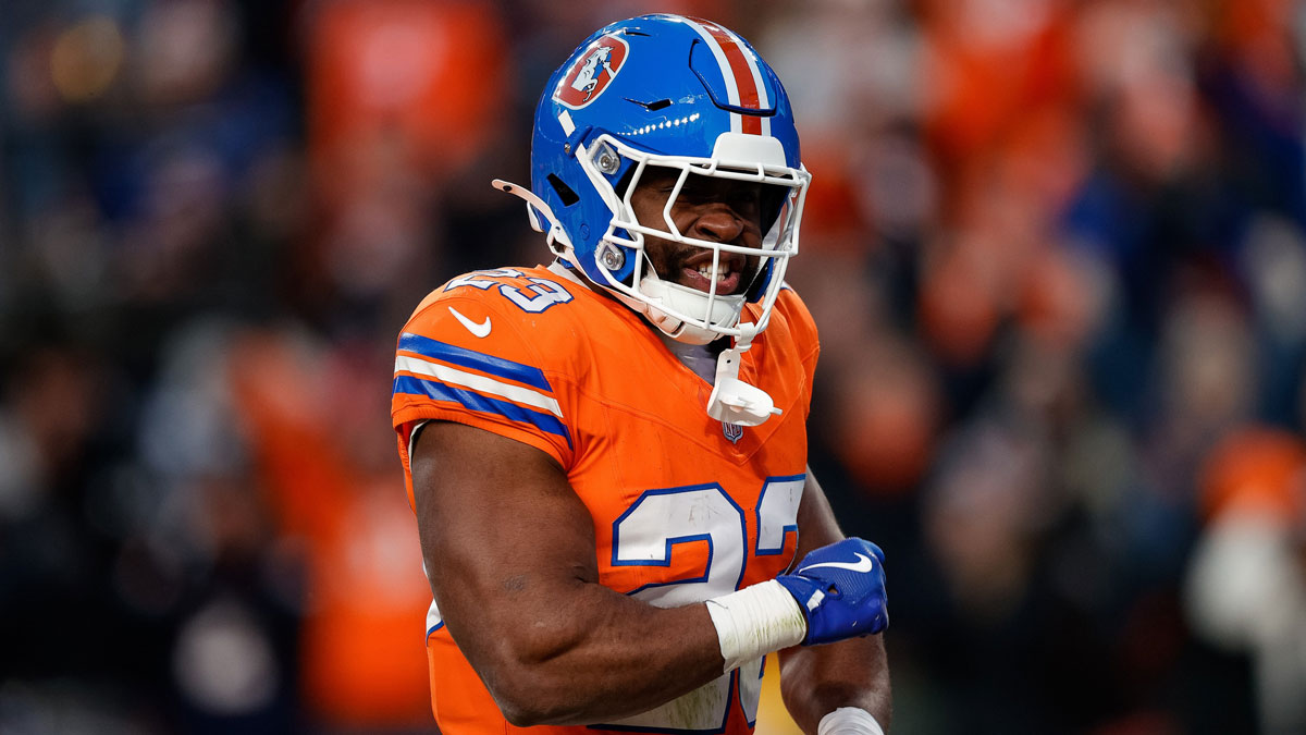 Denver Broncos running back Audric Estime (23) celebrates after a touchdown in the fourth quarter against the Kansas City Chiefs at Empower Field at Mile High.
