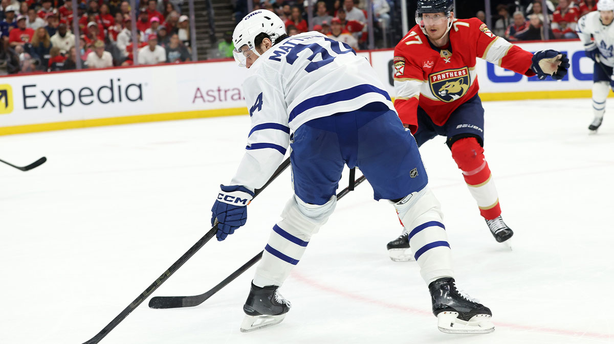 Toronto Maple Leafs center Auston Matthews (34) skates with the puck as Florida Panthers center Evan Rodrigues (17) defends during the third period in game four of the second round of the 2025 Stanley Cup Playoffs at Amerant Bank Arena.