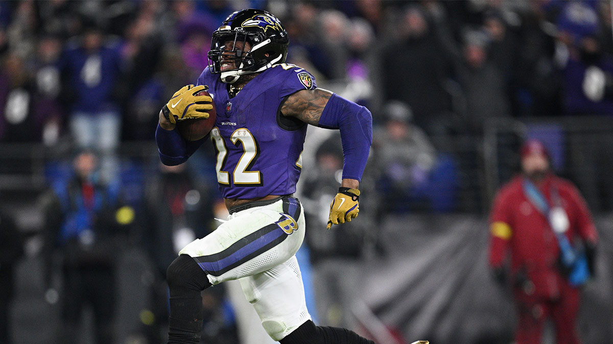 Baltimore Ravens running back Derrick Henry (22) runs to score a touchdown against the Pittsburgh Steelers in the third quarter in an AFC wild card game at M&T Bank Stadium.