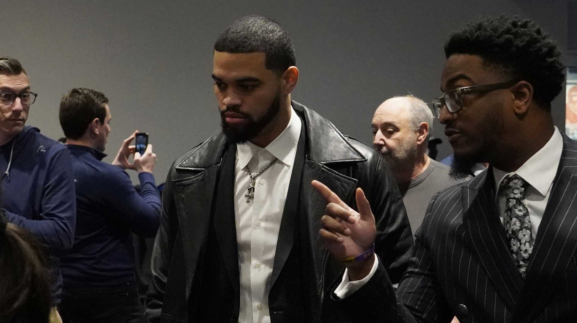 Chicago Bears quarterback Caleb Williams arrives at a press conference introducing new head coach Ben Johnson at PNC Center.