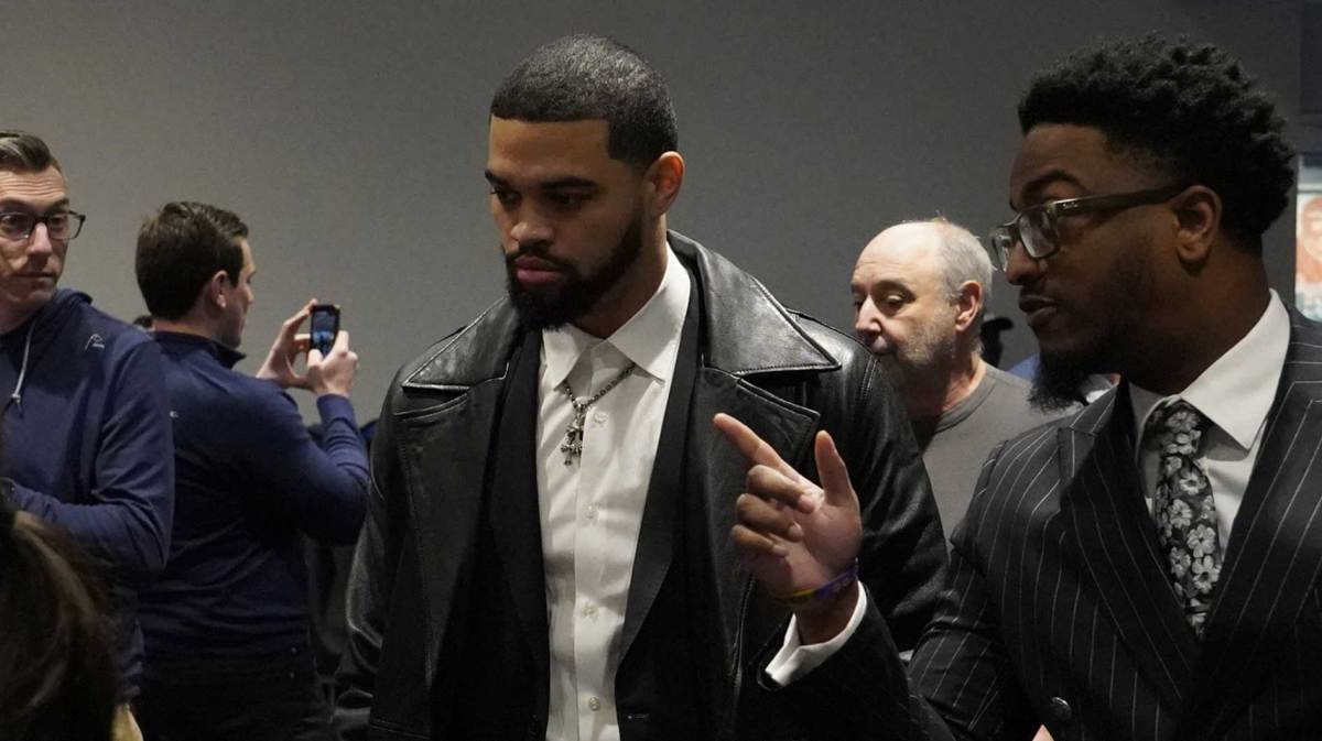 Chicago Bears quarterback Caleb Williams arrives at a press conference introducing new head coach Ben Johnson at PNC Center.