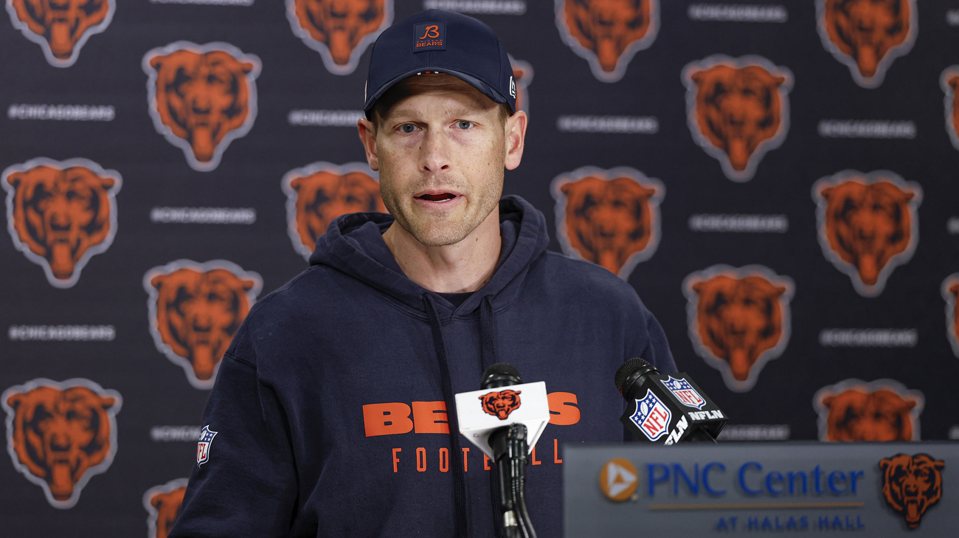 Chicago Bears head coach Ben Johnson (R) speaks during the Rookie Minicamp at Halas Hall.