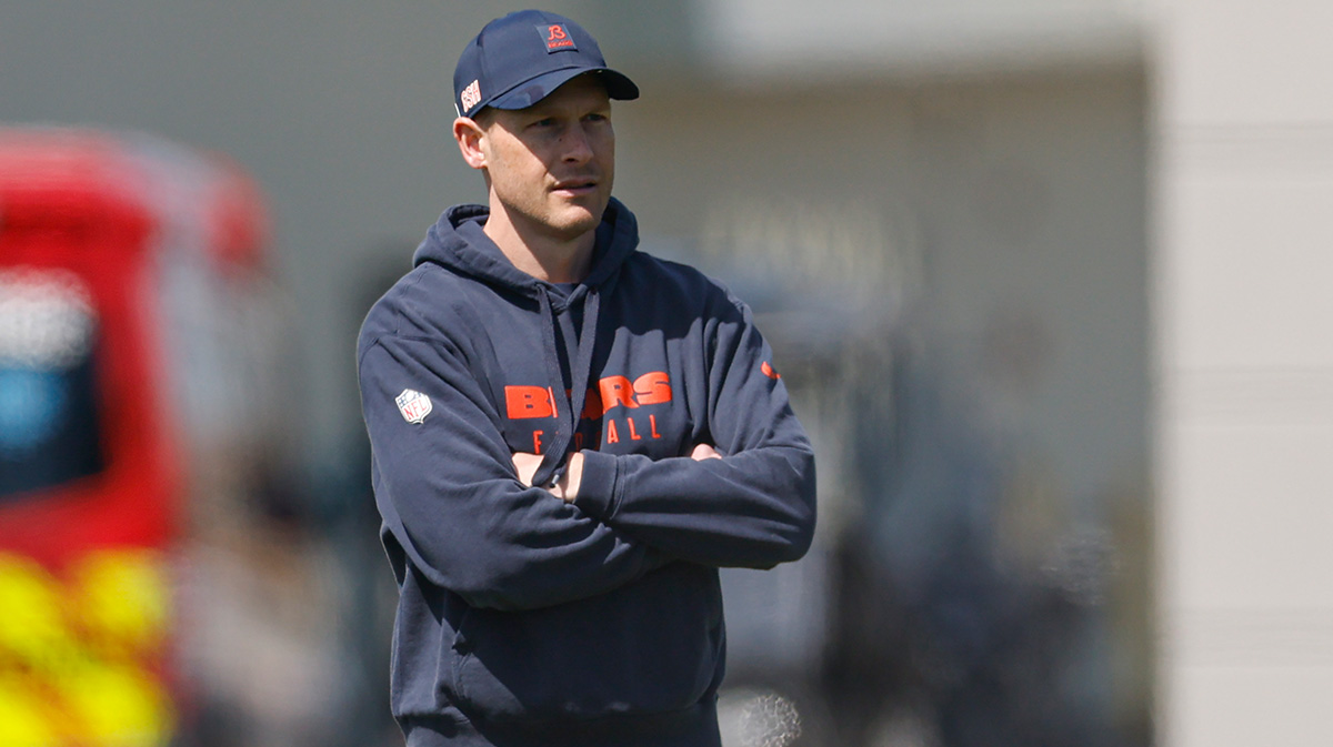 Chicago Bears head coach Ben Johnson (R) looks on during the Rookie Minicamp at Halas Hall.