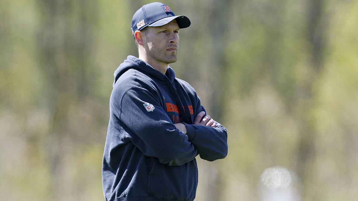 Chicago Bears head coach Ben Johnson (R) looks on during the Rookie Minicamp at Halas Hall.