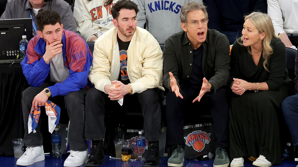 American singers Nick Jonas (left to right) and Kevin Jonas sit court side with American actors Ben Stiller and Christine Taylor during the fourth quarter of game two of the first round of the 2024 NBA Playoffs between the New York Knicks and the Detroit Pistons at Madison Square Garden.