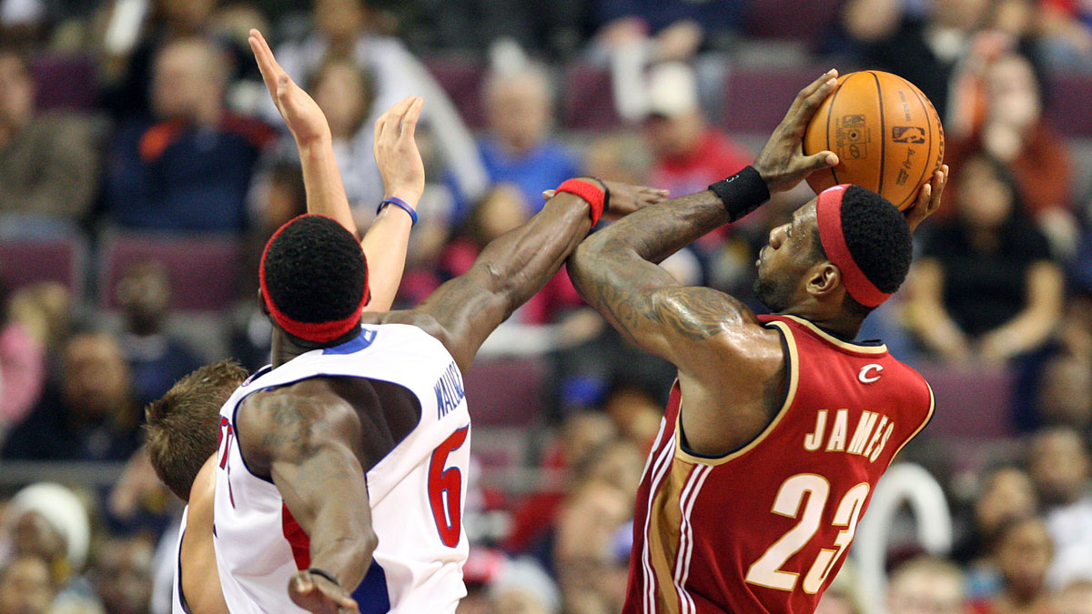Cleveland Cavaliers forward LeBron James (23) shoots over Detroit Pistons player Ben Wallace (6) at the Palace of Auburn Hills.
