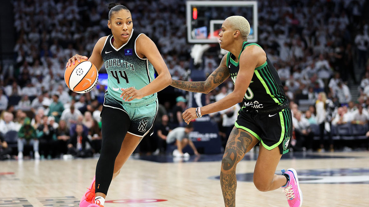 New York Liberty forward Betnijah Laney-Hamilton (44) drives past Minnesota Lynx guard Courtney Williams (10) during the second half of game four of the 2024 WNBA Finals at Target Center.