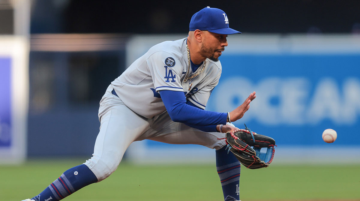 Los Angeles Dodgers shortstop Mookie Betts (50) catches a ground ball against Miami Marlins center fielder Dane Myers (not pictured) during the second inning at loanDepot Park