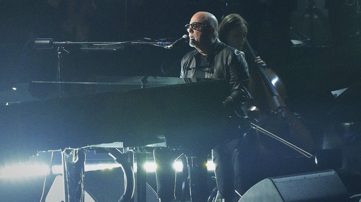 Billy Joel, who canceled his 2025 tour after his brain disorder diagnosis, performing at the Grammys.
