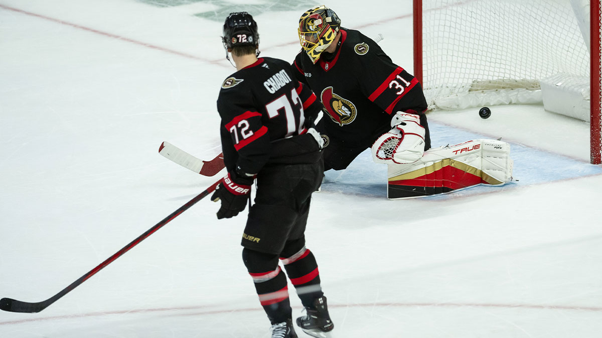 The Chicago Blackhawks score in overtime against Ottawa Senators goalie Anton Forsberg (31) at the Canadian Tire Centre.