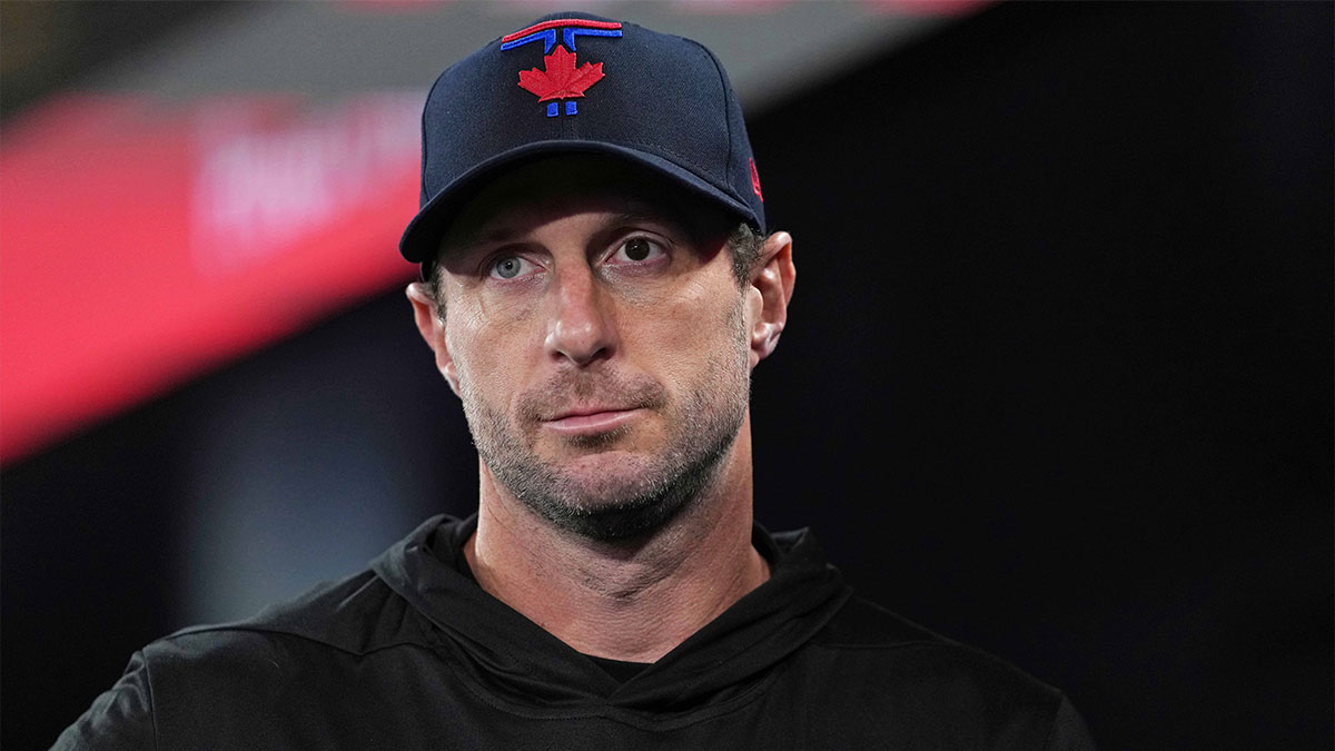 Toronto Blue Jays starting pitcher Max Scherzer (31) walks in the dugout before the start of a game against the Baltimore Orioles at Rogers Centre.