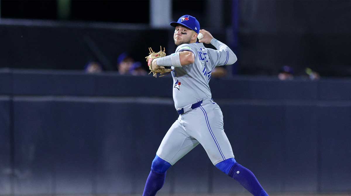 Toronto Blue Jays shortstop Bo Bichette (11) throws to first for an out against the Tampa Bay Rays in the eighth inning.