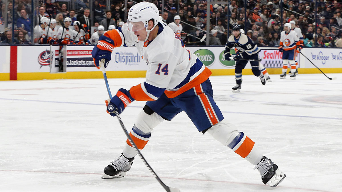 New York Islanders center Bo Horvat (14) wrists a shot on goal against the Columbus Blue Jackets during the third period at Nationwide Arena.