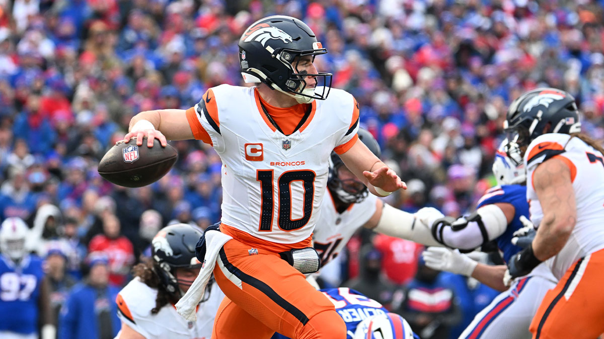 Jan 12, 2025; Orchard Park, New York, USA; Denver Broncos quarterback Bo Nix (10) throws downfield during the second quarter against the Buffalo Bills in an AFC wild card game at Highmark Stadium. Mandatory Credit: Mark Konezny-Imagn Images
