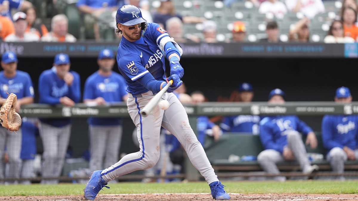 Kansas City Royals shortstop Bobby Witt Jr. (7) hits an RBI double against the Baltimore Orioles during the eighth inning at Oriole Park at Camden Yards.