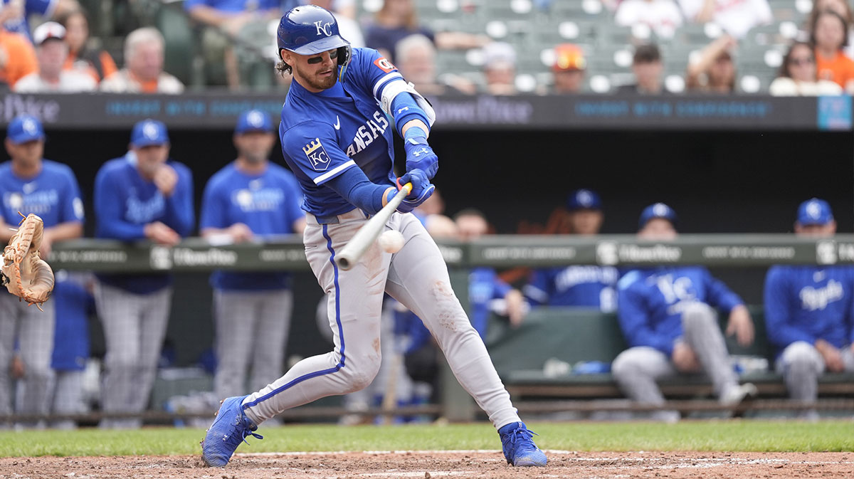 Kansas City Royals shortstop Bobby Witt Jr. (7) hits an RBI double against the Baltimore Orioles during the eighth inning at Oriole Park at Camden Yards