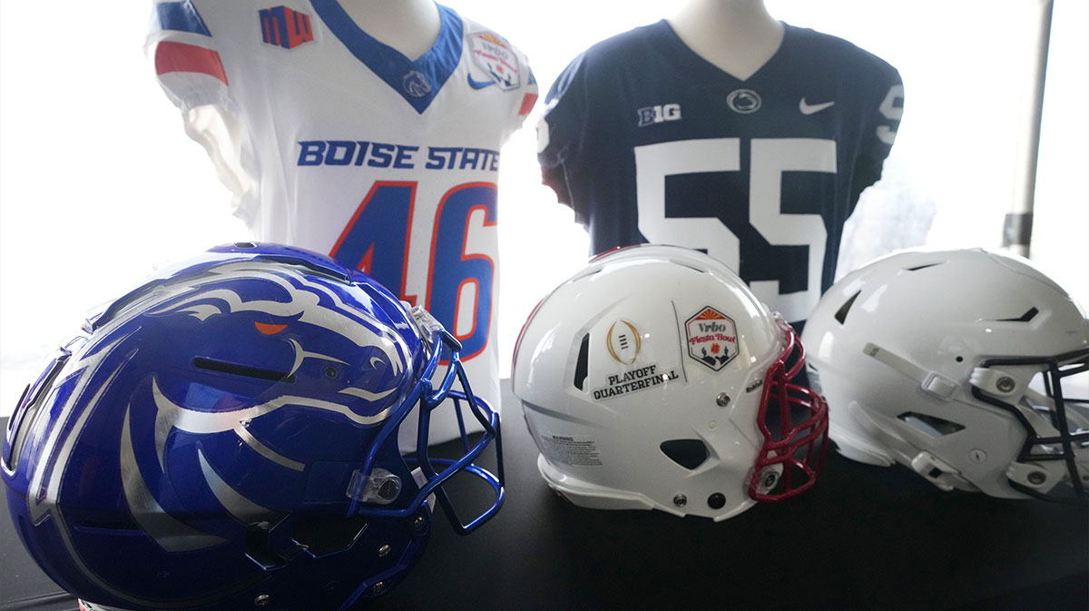 Jerseys and helmets of the Boise State Broncos and Penn State Nittany Lions on display at Phoenix Sky Harbor International Airport, Ragsdale Executive Terminal
