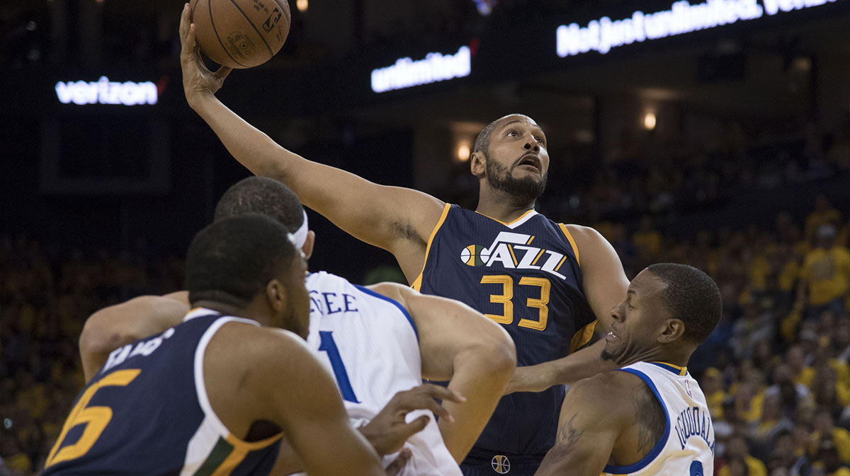 Utah Jazz center Boris Diaw (33) shoots the basketball against Golden State Warriors forward Andre Iguodala (9) during the third quarter in game two of the second round of the 2017 NBA Playoffs at Oracle Arena. The Warriors defeated the Jazz 115-104.