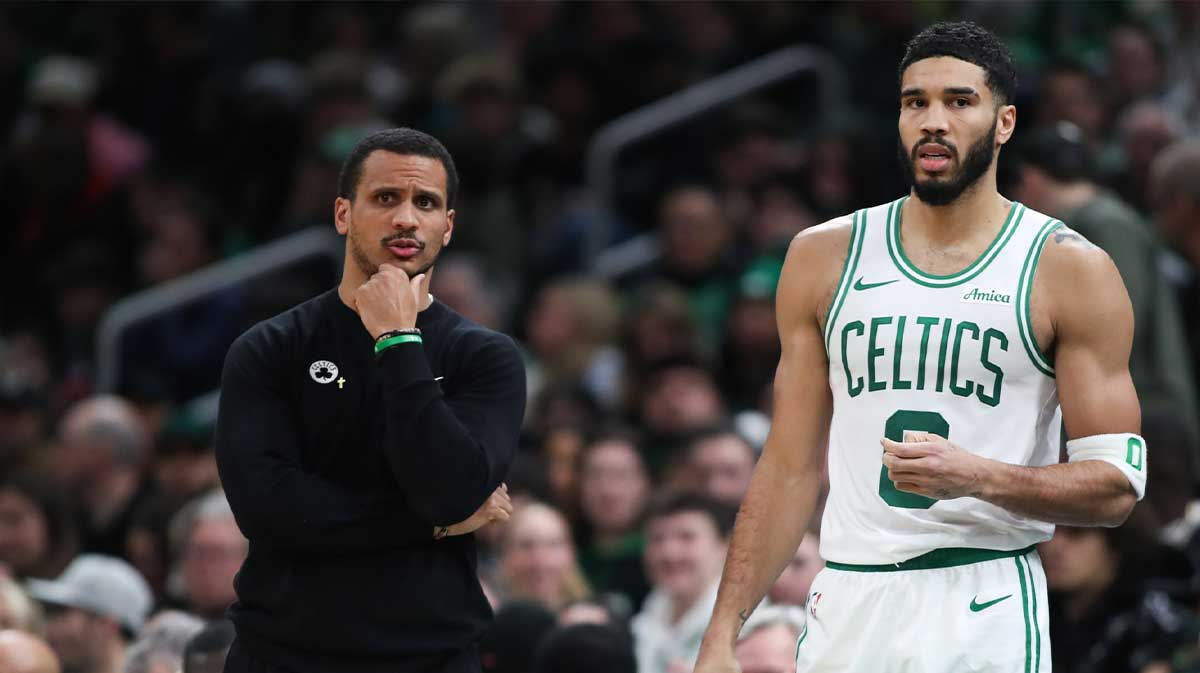 Boston Celtics head coach Joe Mazzulla and Boston Celtics forward Jayson Tatum (0) react during the first half against the Memphis Grizzlies at TD Garden.