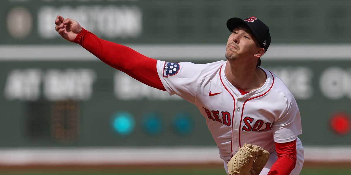 Boston Red Sox starting pitcher Walker Buehler (0) delivers a pitch during the first inning against the St. Louis Cardinals at Fenway Park.