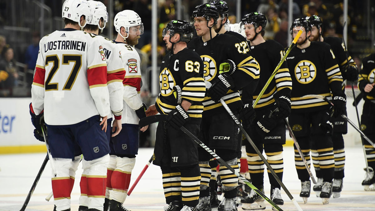 Florida Panthers center Sam Bennett (9) and Boston Bruins left wing Brad Marchand (63) speak after the Panthers defeated the Bruins in game six of the second round of the 2024 Stanley Cup Playoffs at TD Garden.