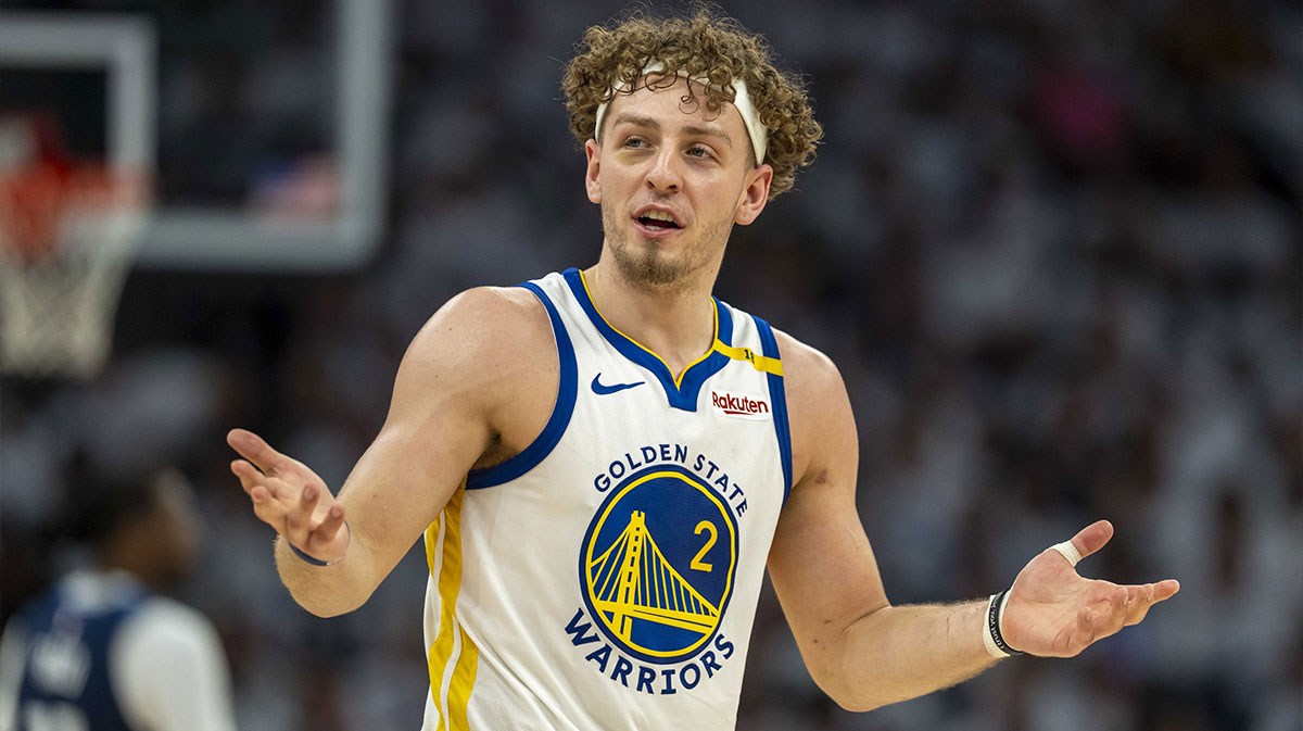 Golden State Warriors guard Brandin Podziemski (2) reacts to a foul called against the Minnesota Timberwolves in the second half during game five of the second round for the 2025 NBA Playoffs at Target Center.