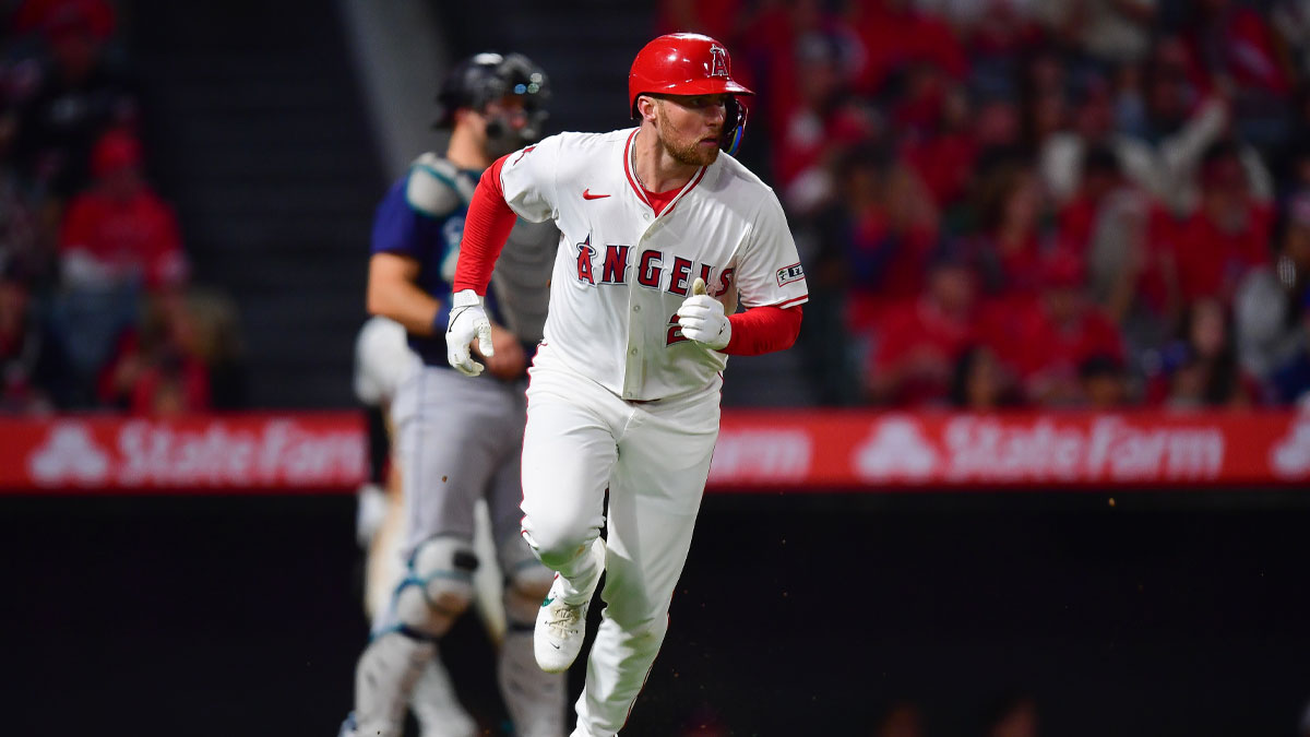 Los Angeles Angels second baseman Brandon Drury (23) runs after hitting an RBI single against the Seattle Mariners during the sixth inning at Angel Stadium.