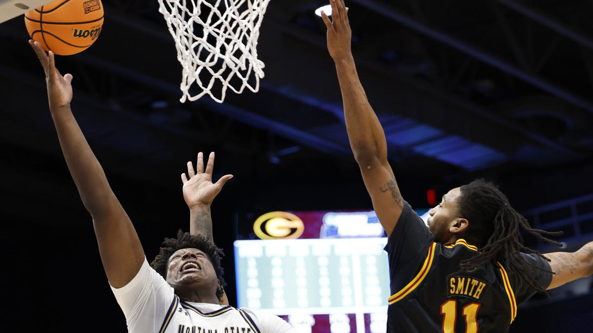 Montana State Bobcats forward Brandon Walker (2) shoots the ball defended by Grambling State Tigers guard Jourdan Smith (11) in the second half at UD Arena.