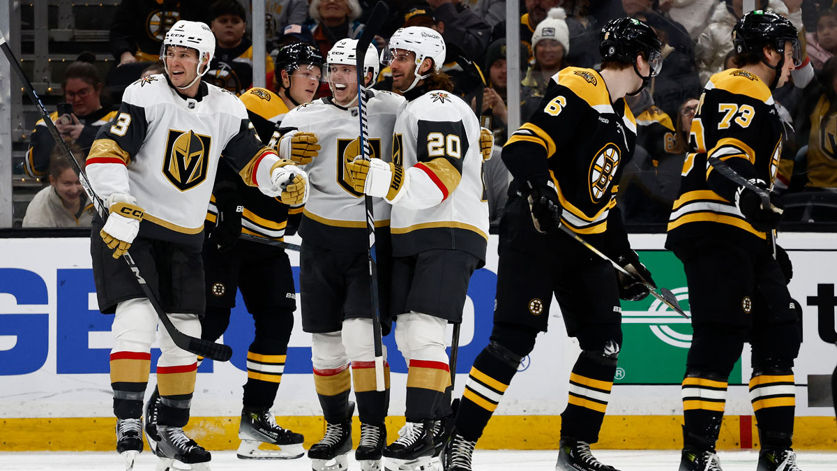 As Boston Bruins defenseman Mason Lohrei (6) and defenseman Charlie McAvoy (73) skate away, Vegas Golden Knights left wing Brandon Saad (20) and defenseman Brayden McNabb (3) celebrate with left wing Pavel Dorofeyev (16) after his goal tied the game during the third period at TD Garden.