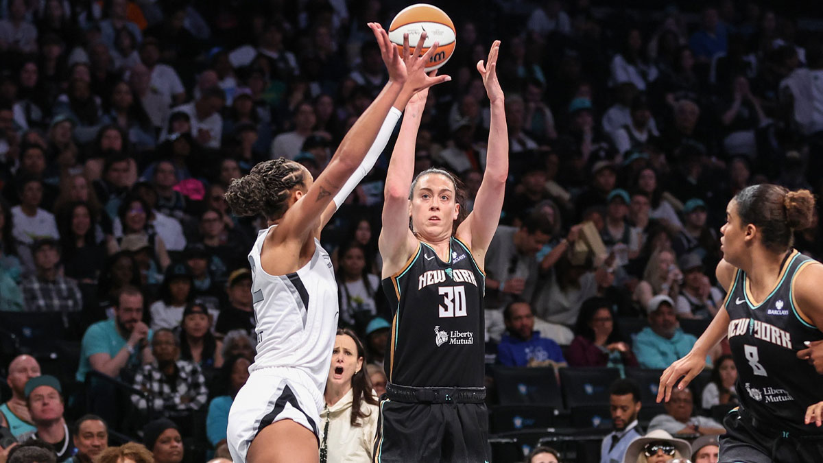 New York Liberty forward Breanna Stewart (30) takes a three point shot past Las Vegas Aces center A'ja Wilson (22) in the third quarter at Barclays Center.