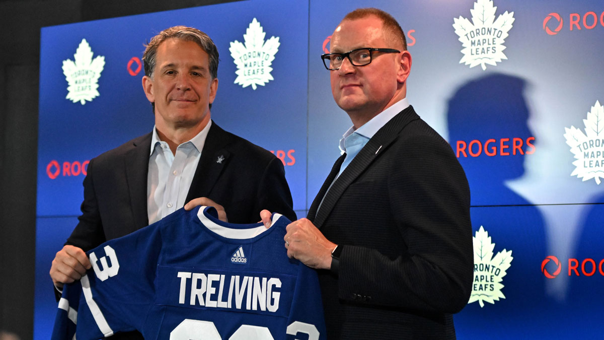 Toronto Maple Leafs new general manager Brad Treliving is introduced by club president Brendan Shanahan (left) at a press conference at Scotiabank Arena.