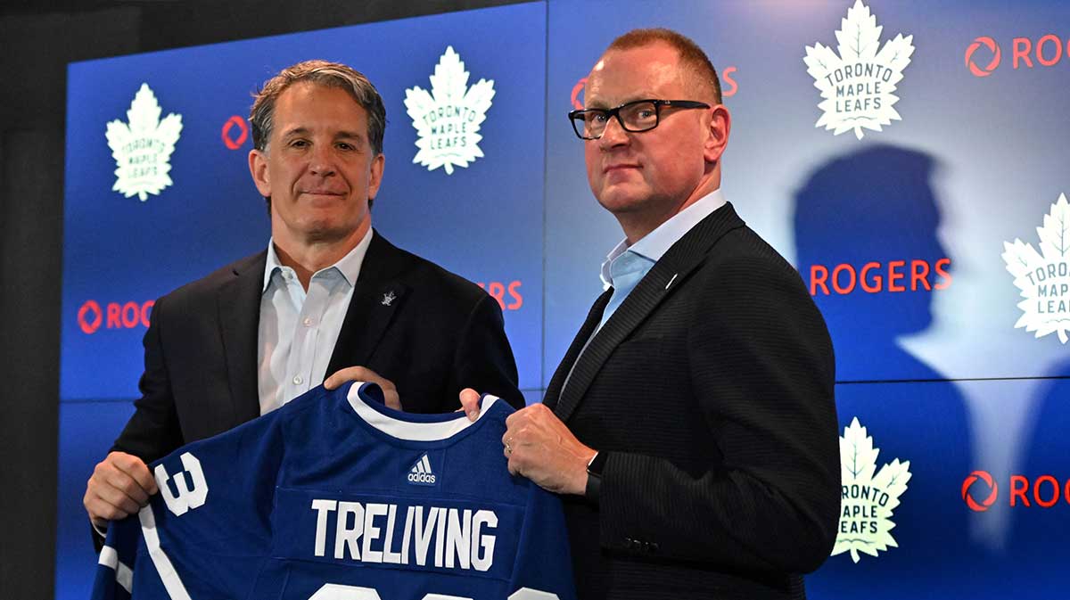 Toronto Maple Leafs new general manager Brad Treliving is introduced by club president Brendan Shanahan (left) at a press conference at Scotiabank Arena.