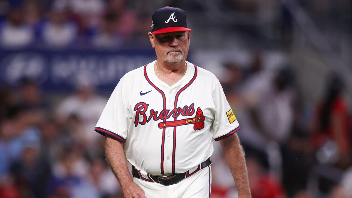 Atlanta Braves manager Brian Snitker (43) on the field against the Cincinnati Reds in the seventh inning at Truist Park.