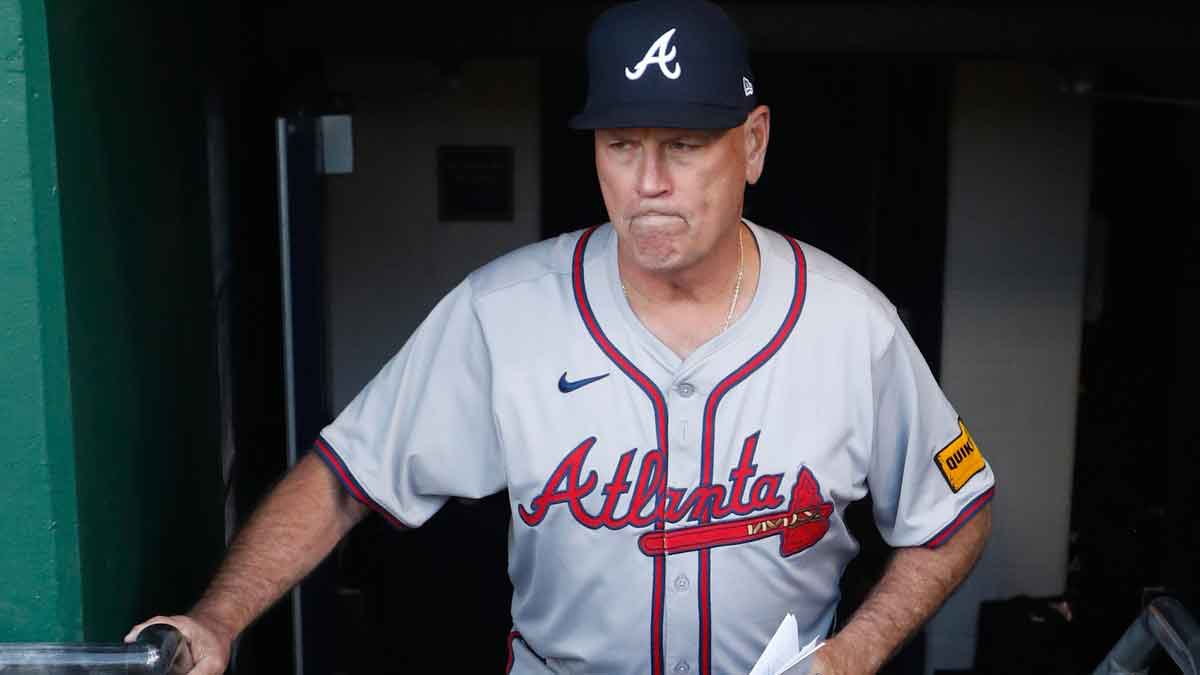 Atlanta Braves manager Brian Snitker (43) enters the dugout to play the Pittsburgh Pirates.