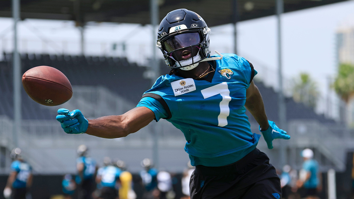 Jacksonville Jaguars wide receiver Brian Thomas Jr. (7) can’t one-hand grab a pass during the first organized team activity at Miller Electric Center Monday, May 19, 2025 in Jacksonville, Fla.