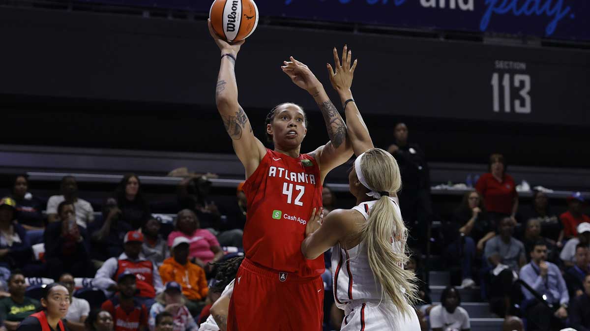 Atlanta Dream center Brittney Griner (42) shoots the ball over Washington Mystics forward Kiki Iriafen (44) in the first half at CareFirst Arena.