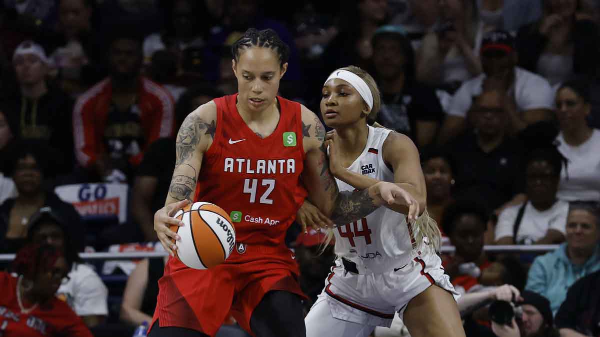 Atlanta Dream center Brittney Griner (42) drives to the basket as Washington Mystics forward Kiki Iriafen (44) defends in the second half at CareFirst Arena.