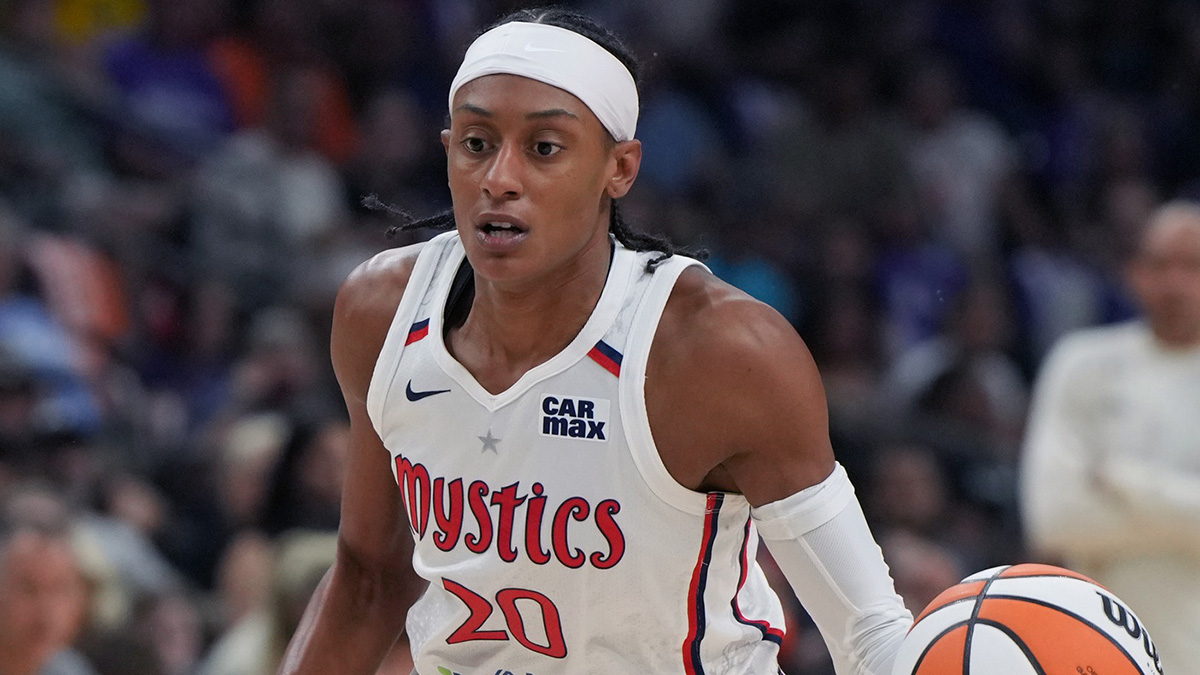 Washington Mystics guard Brittney Sykes (20) drives against the Phoenix Mercury in the first half at Footprint Center.